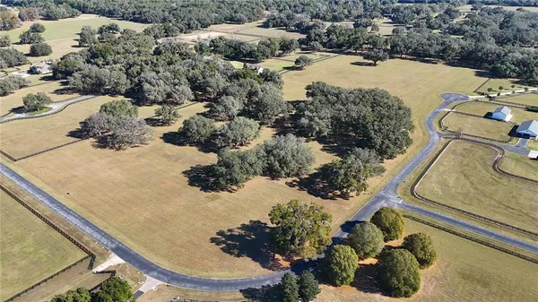 a view of a swimming pool from a balcony