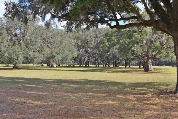 a view of a swimming pool with an outdoor space and seating area
