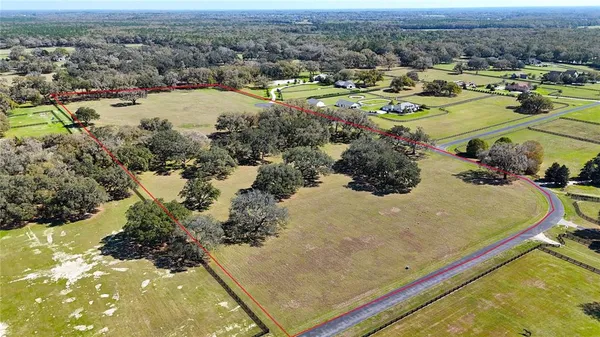 a view of a lake with a house