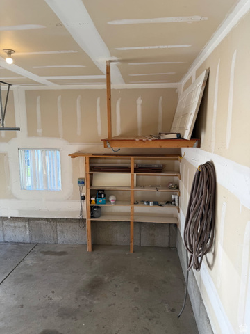 1563 South 600 East Springville, UT 84663 - Photo 27 of 30 Garage interior with concrete flooring and exposed concrete foundation