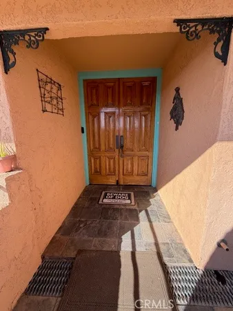 a kitchen with a sink appliances and cabinets