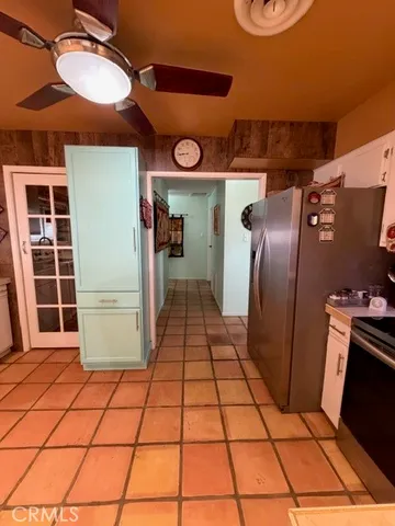 a view of a hallway with a couch