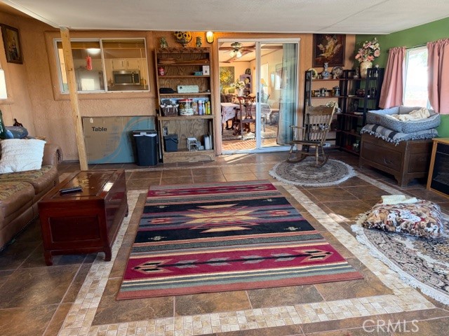 5800 Modoc Trail Big River, CA 92242 - Photo 41 of 73 a view of water heater room with wooden floor and rug