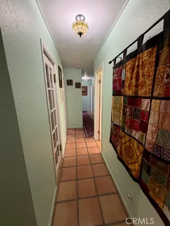 a room with furniture and a flat screen tv