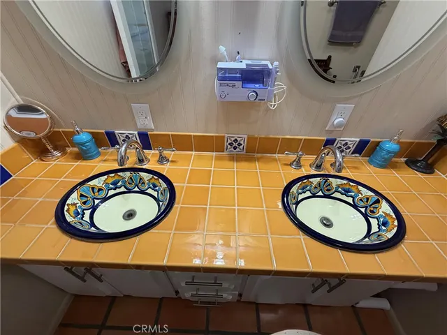 a view of gym room with gym equipment