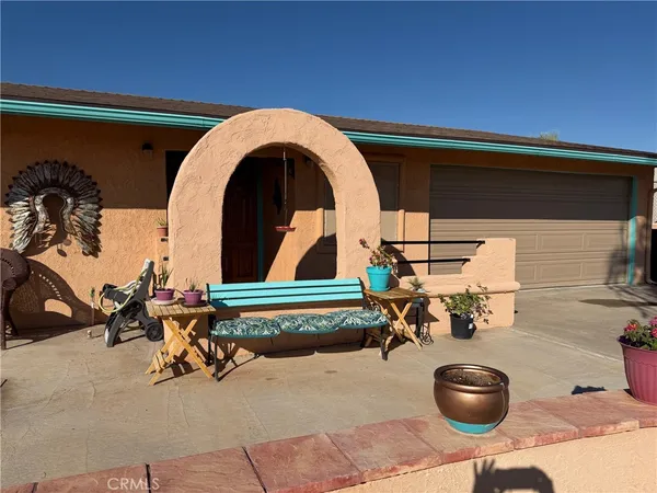 a view of a dry yard with mountain