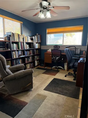 a view of a garage with a table and chairs