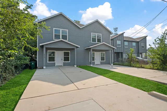 a front view of a house with yard