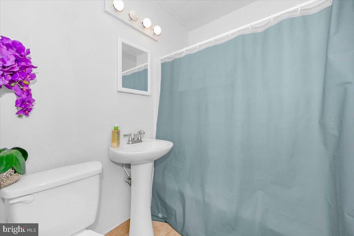 302 Manor Court Frederick, MD 21701 - Photo 20 of 33 Charming bathroom with serene hues.