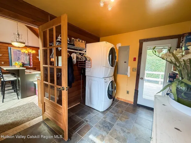 a view of a patio with furniture and a potted plants