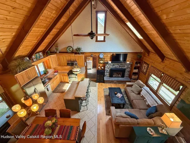 a outdoor dining space with furniture and a potted plant