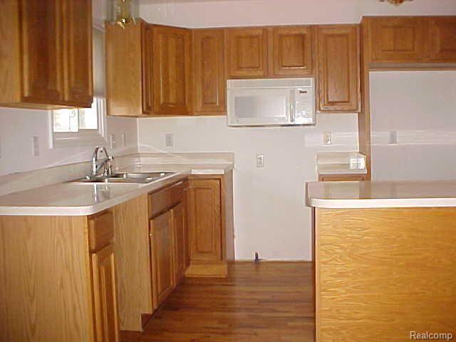 5011 North Fowlerville Road Fowlerville, MI 48836 - Photo 3 of 13 Kitchen