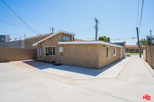 a front view of a house with a garage