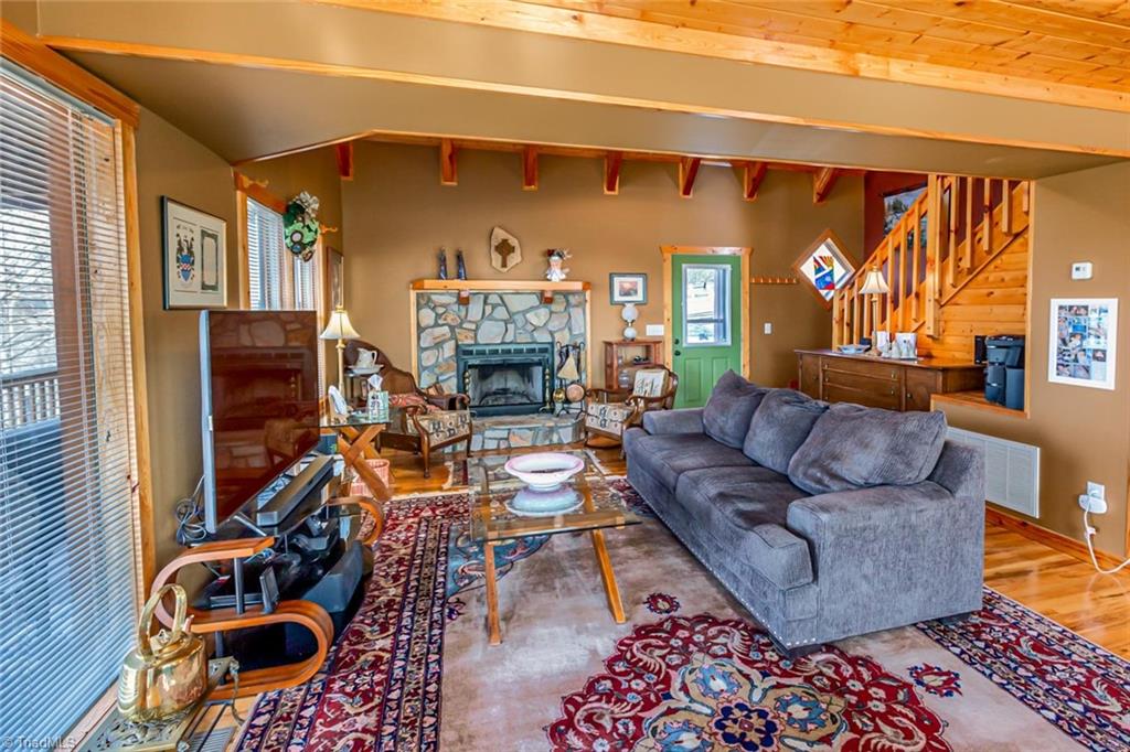 83 Mountain Ridge Road Piney Creek, NC 28663 - Photo 15 of 39 View of living area from dining