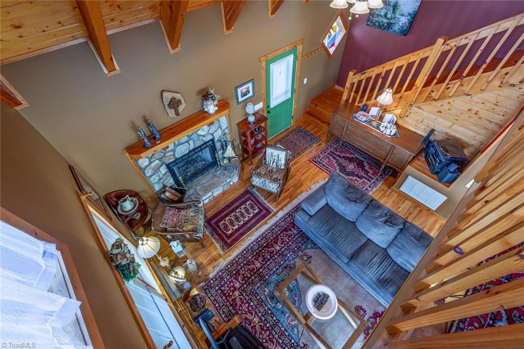 83 Mountain Ridge Road Piney Creek, NC 28663 - Photo 3 of 39 View of the great room from loft above