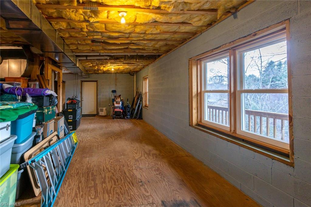 83 Mountain Ridge Road Piney Creek, NC 28663 - Photo 39 of 39 Lots of storage available in the unfinished heated/cooled basement