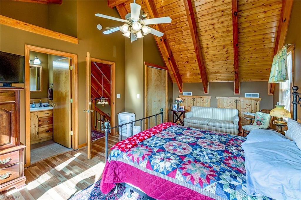 83 Mountain Ridge Road Piney Creek, NC 28663 - Photo 5 of 39 Primary bedroom on second level