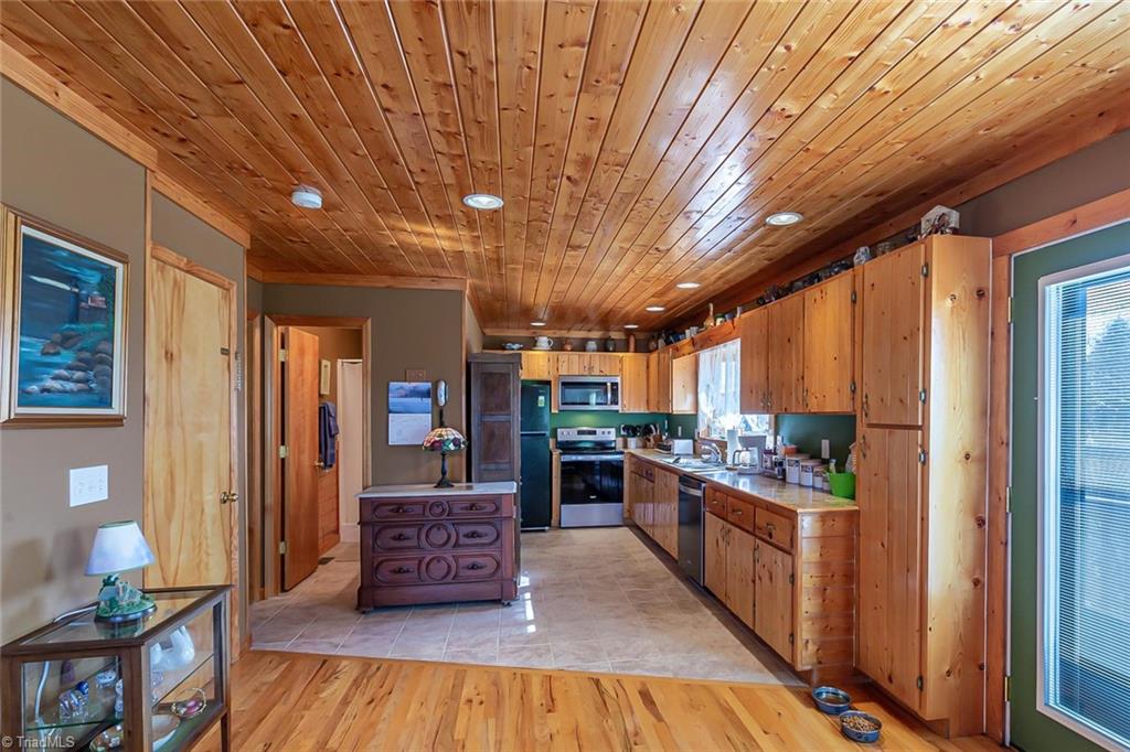 83 Mountain Ridge Road Piney Creek, NC 28663 - Photo 7 of 39 Kitchen from the dining area