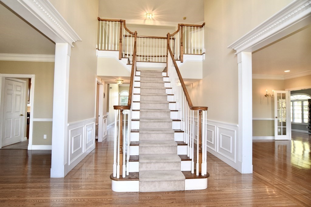 43 Cherokee Road Canton, MA 02021 - Photo 11 of 22 a view of entryway and hall with wooden floor