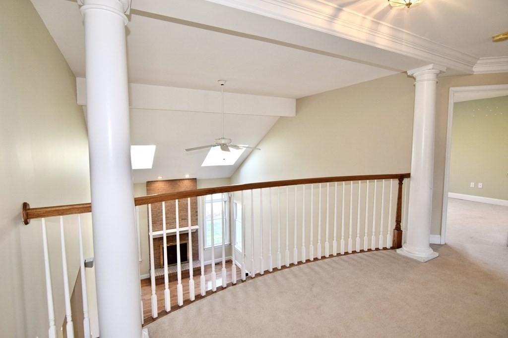 43 Cherokee Road Canton, MA 02021 - Photo 12 of 22 a view of a hallway with a large window