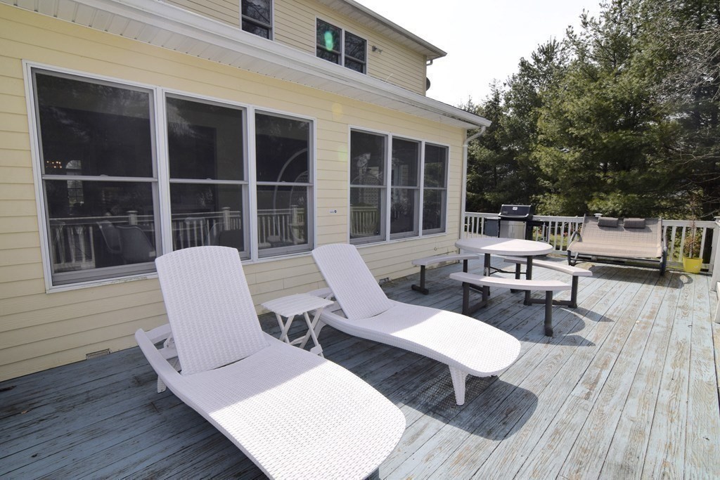 43 Cherokee Road Canton, MA 02021 - Photo 19 of 22 a view of a lounge chairs in a patio