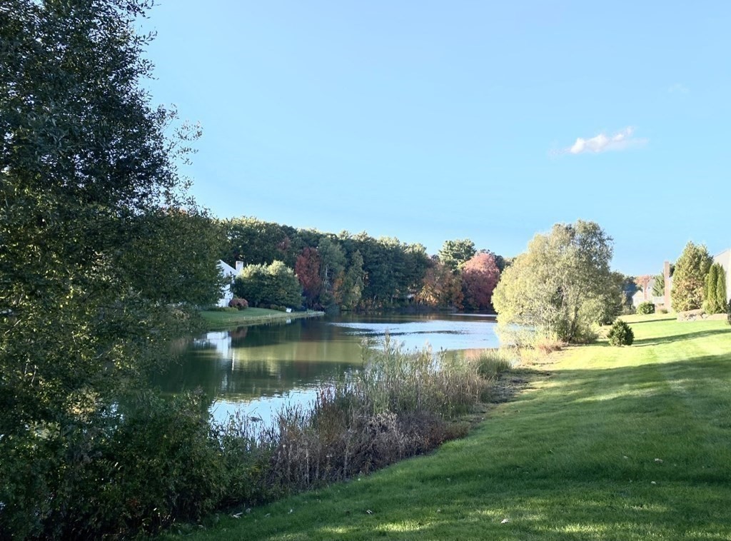 43 Cherokee Road Canton, MA 02021 - Photo 22 of 22 a view of a lake with houses in the back
