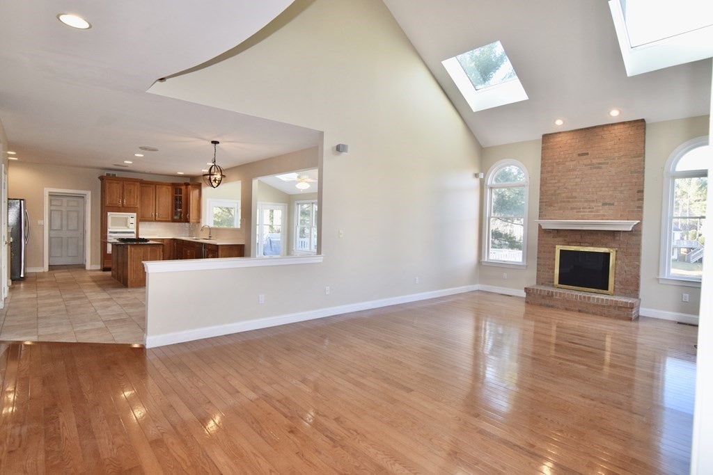 43 Cherokee Road Canton, MA 02021 - Photo 9 of 22 a view of a livingroom with a fireplace