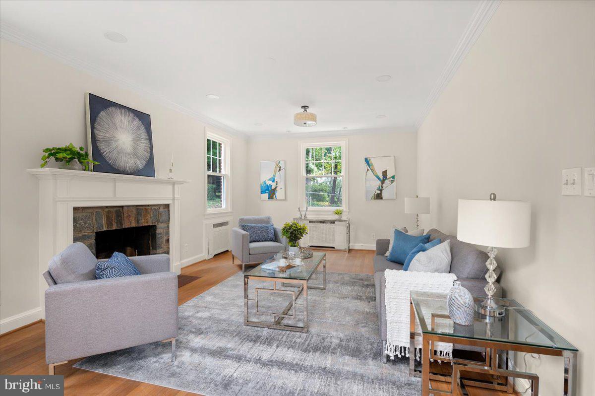 9214 Crosby Road Silver Spring, MD 20910 - Photo 12 of 65 a living room with furniture and a fireplace