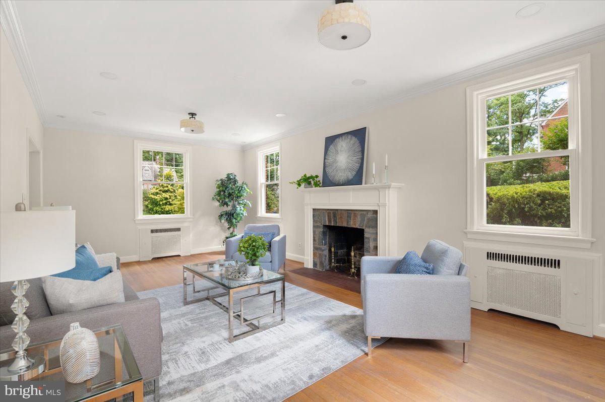 9214 Crosby Road Silver Spring, MD 20910 - Photo 13 of 65 a living room with furniture and a fireplace