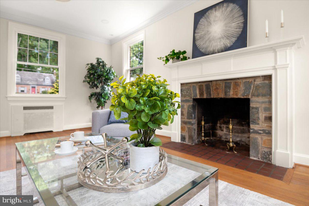9214 Crosby Road Silver Spring, MD 20910 - Photo 14 of 65 a living room with furniture and a fireplace