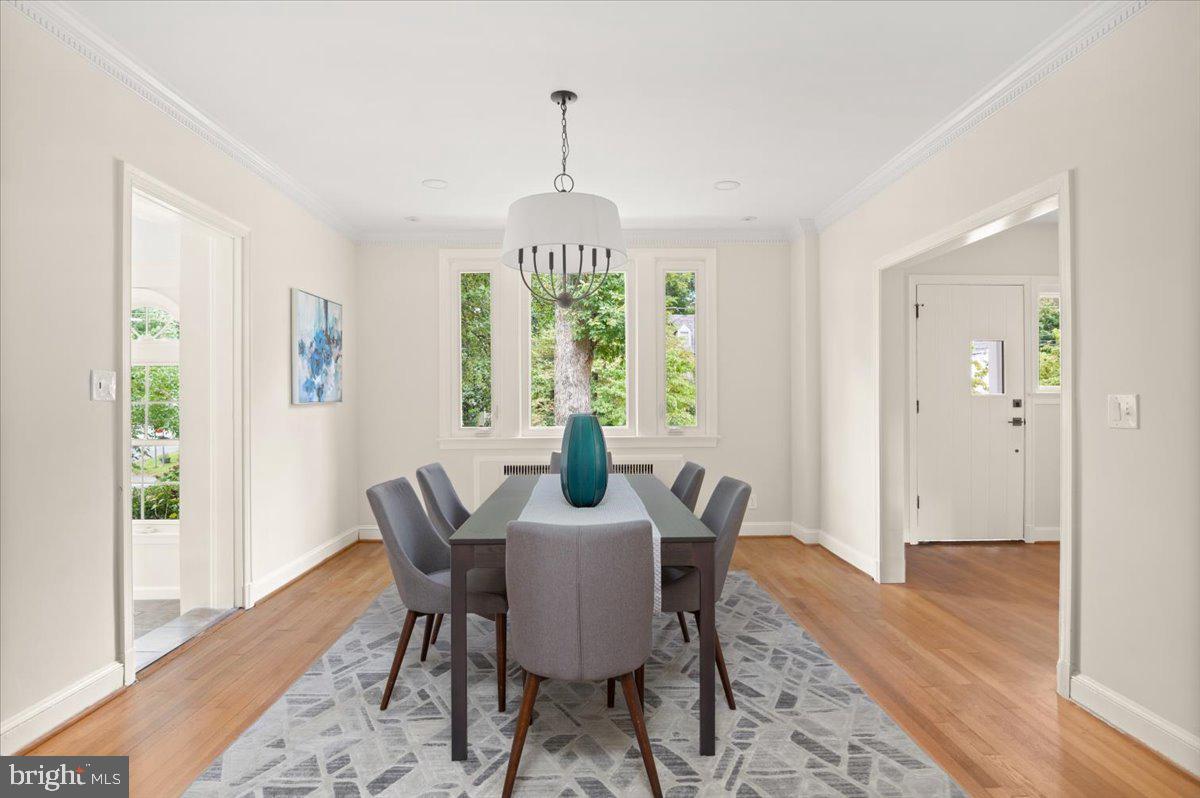 9214 Crosby Road Silver Spring, MD 20910 - Photo 18 of 65 a view of a dining room with furniture window and wooden floor