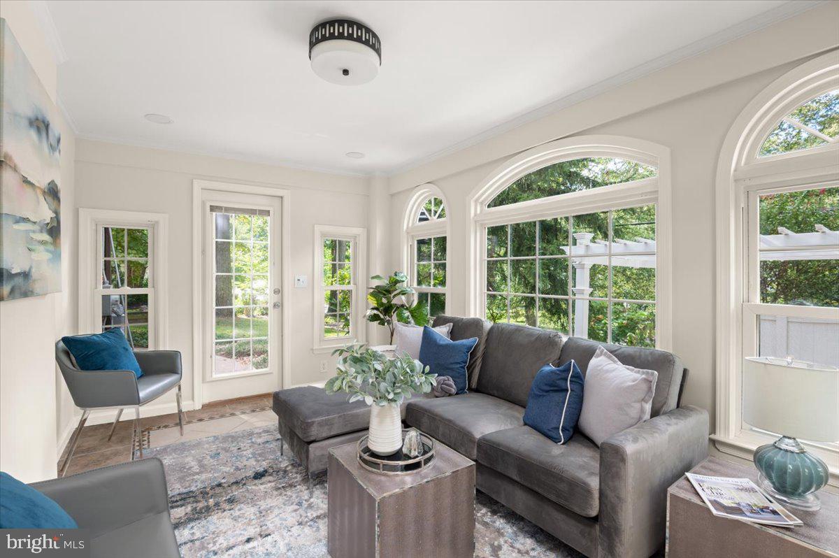 9214 Crosby Road Silver Spring, MD 20910 - Photo 19 of 65 a living room with furniture and a large window