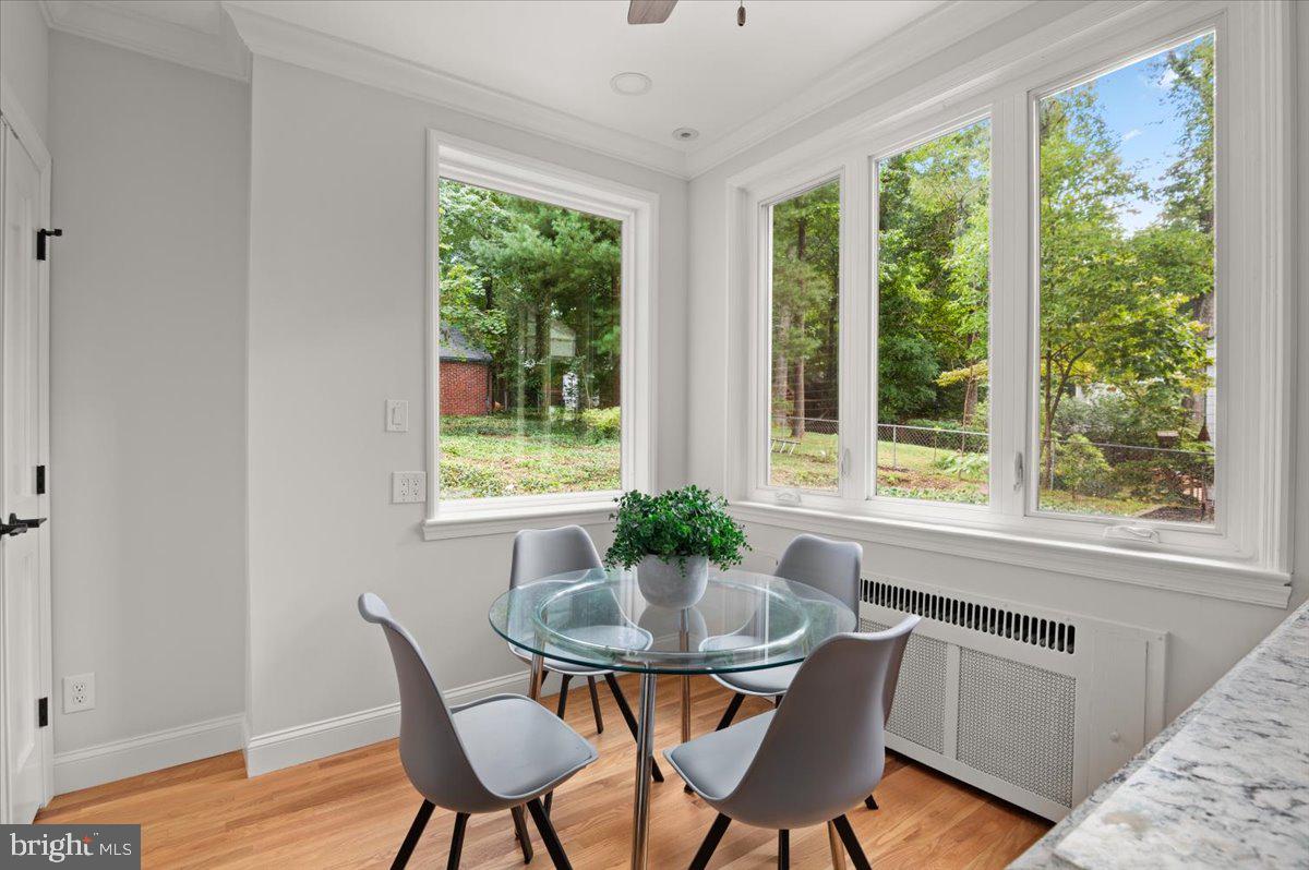 9214 Crosby Road Silver Spring, MD 20910 - Photo 28 of 65 a dining room with furniture and window