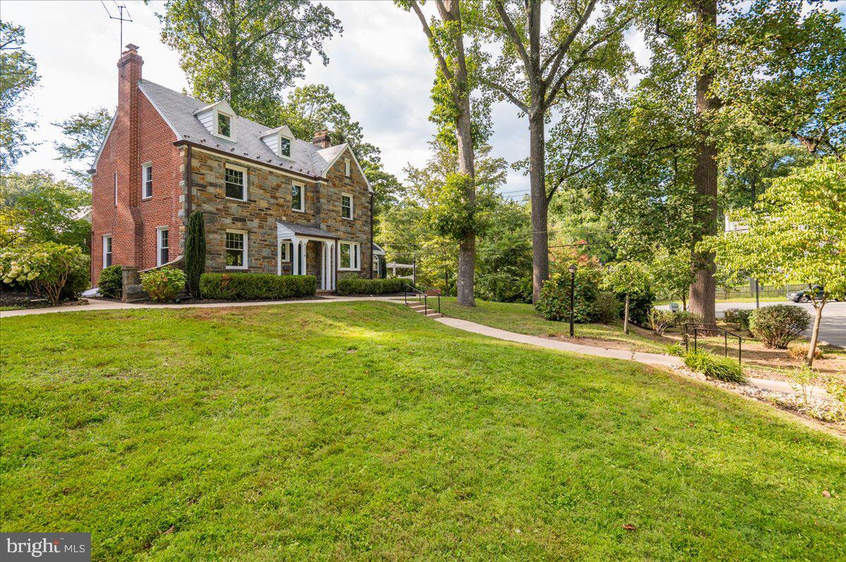 9214 Crosby Road Silver Spring, MD 20910 - Photo 3 of 65 a view of a big yard with large trees
