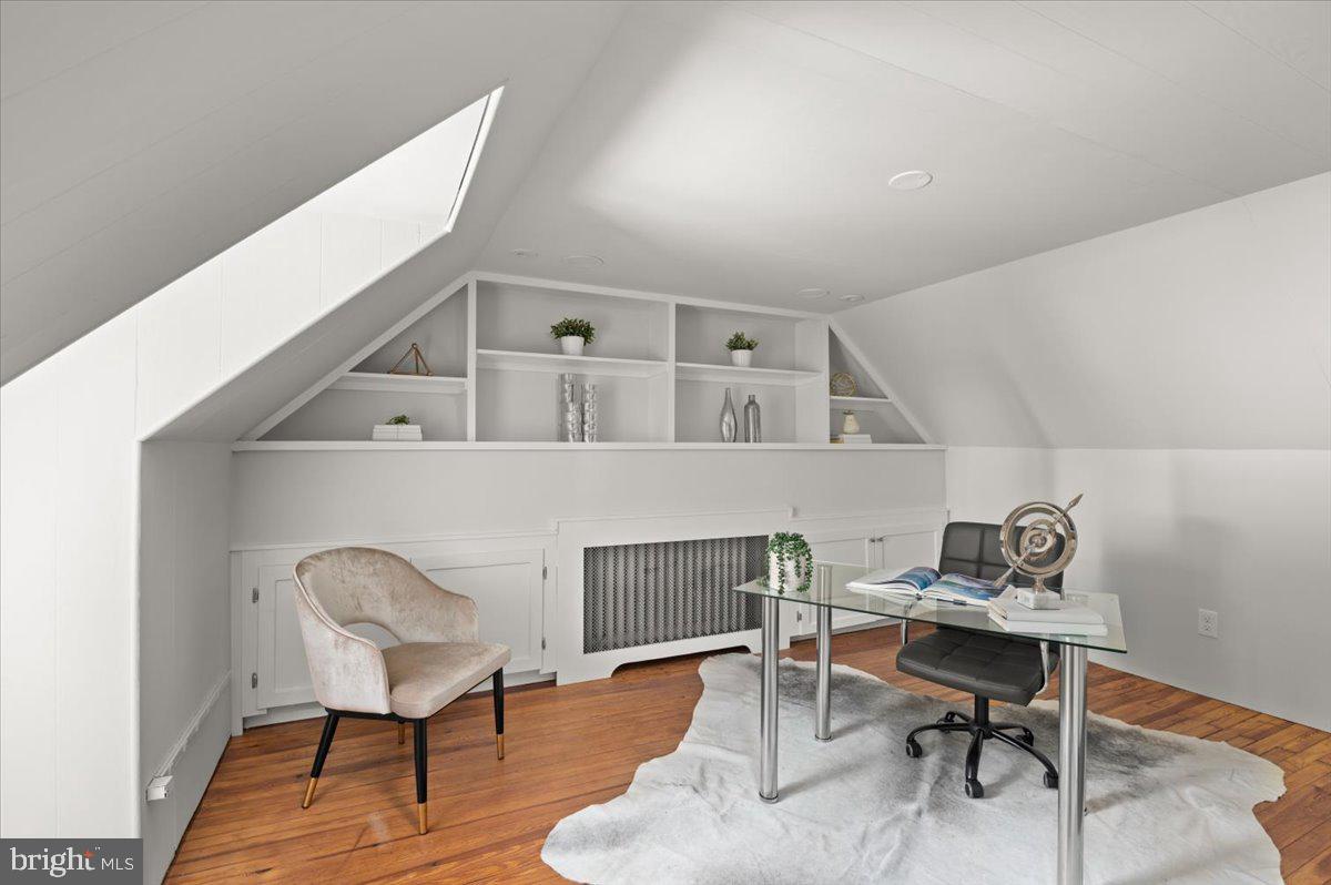 9214 Crosby Road Silver Spring, MD 20910 - Photo 40 of 65 a workspace with furniture and a wooden floor