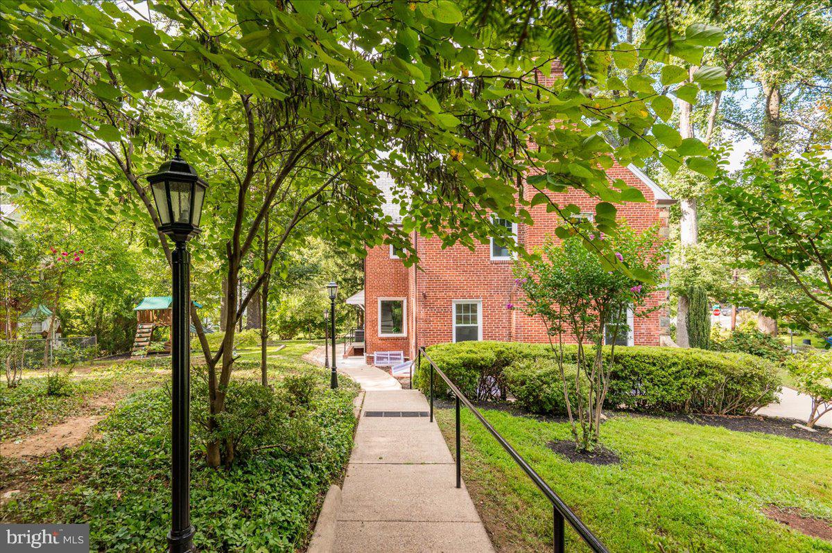 9214 Crosby Road Silver Spring, MD 20910 - Photo 53 of 65 a front view of a house with a yard