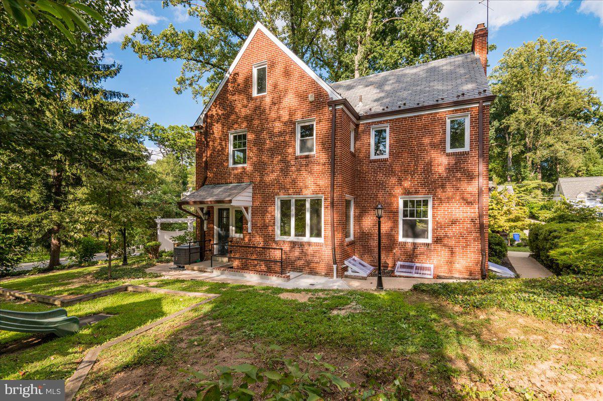 9214 Crosby Road Silver Spring, MD 20910 - Photo 56 of 65 front view of a house with a yard