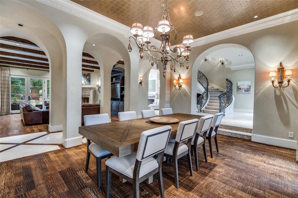 234 West Bethel Road Coppell, TX 75019 - Photo 11 of 40 a view of a dining room with furniture and chandelier