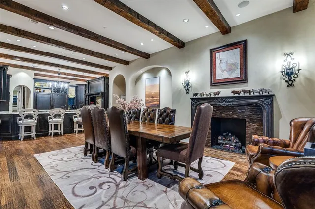 a view of a livingroom with furniture and a fireplace