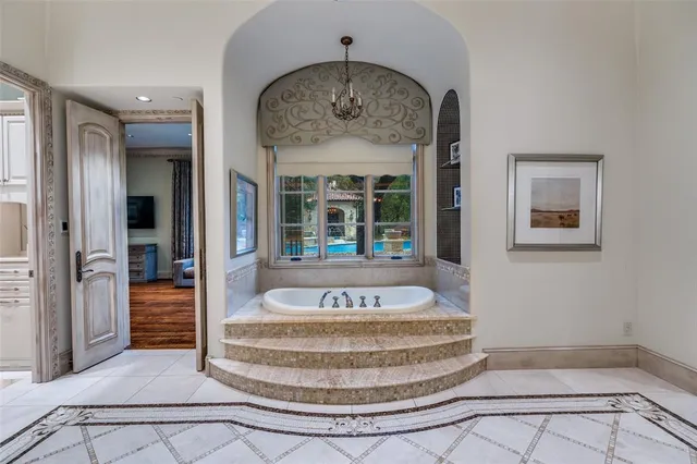 a view of a hallway with windows