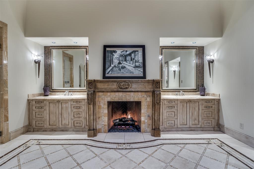 234 West Bethel Road Coppell, TX 75019 - Photo 20 of 40 a living room with furniture and a fireplace