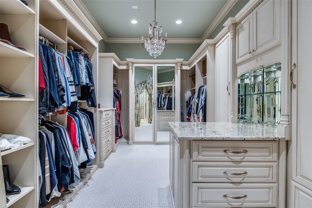 234 West Bethel Road Coppell, TX 75019 - Photo 22 of 40 a view of a entryway with furniture and chandelier
