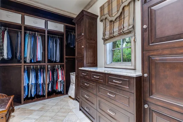 a view of a closet with storage