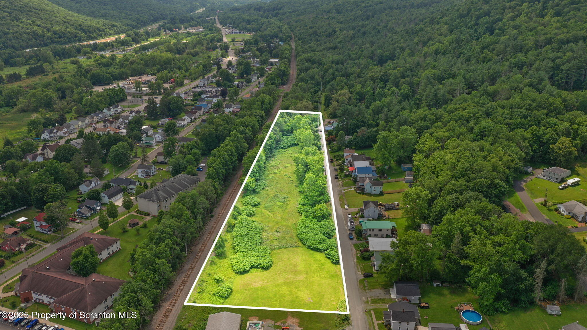 Railroad Avenue Hallstead, PA 18822 - Photo 1 of 11 a view of a yard