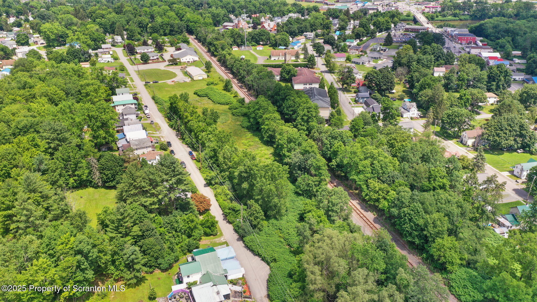 Railroad Avenue Hallstead, PA 18822 - Photo 10 of 11 an aerial view of residential houses with outdoor space