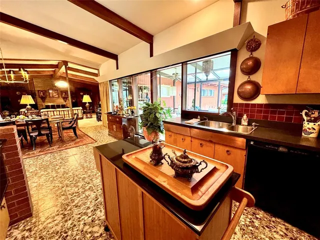 an outdoor space with seating area and furniture