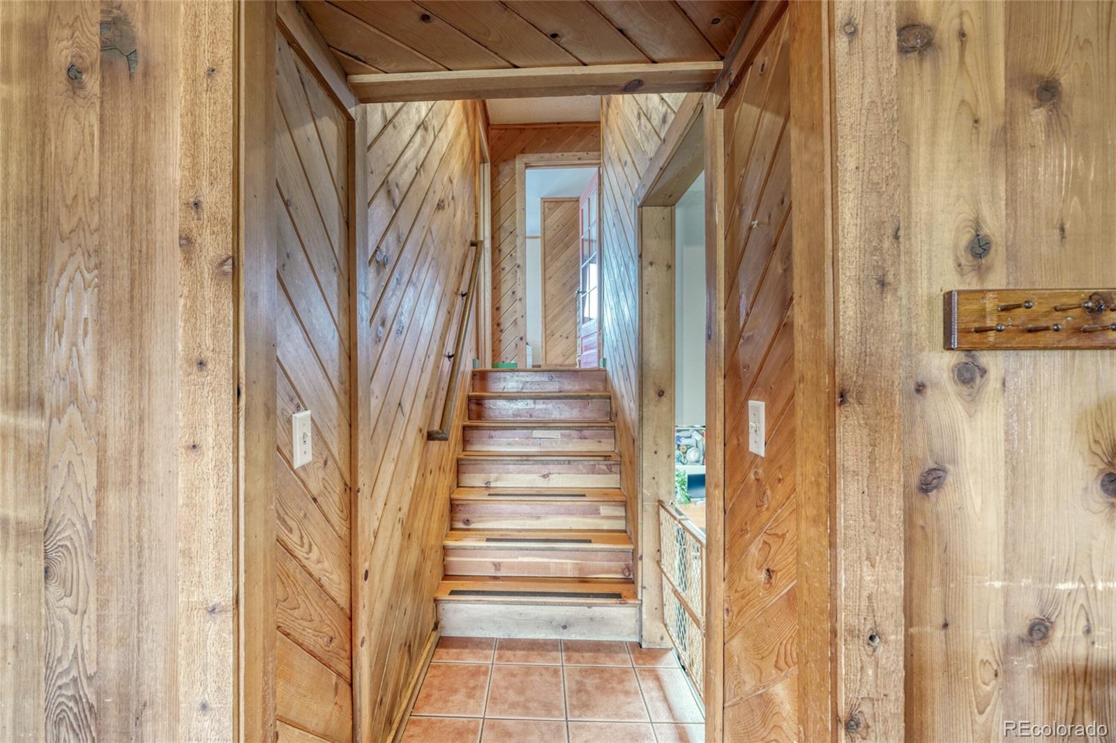 1335 F Street Salida, CO 81201 - Photo 18 of 44 a view of a hallway with wooden floor and entryway
