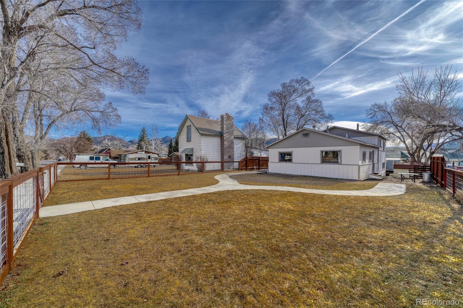1335 F Street Salida, CO 81201 - Photo 2 of 44 a view of swimming pool with trees in front of it