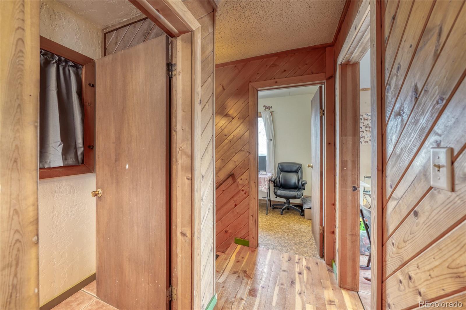 1335 F Street Salida, CO 81201 - Photo 25 of 44 a view of hallway with livingroom and furniture