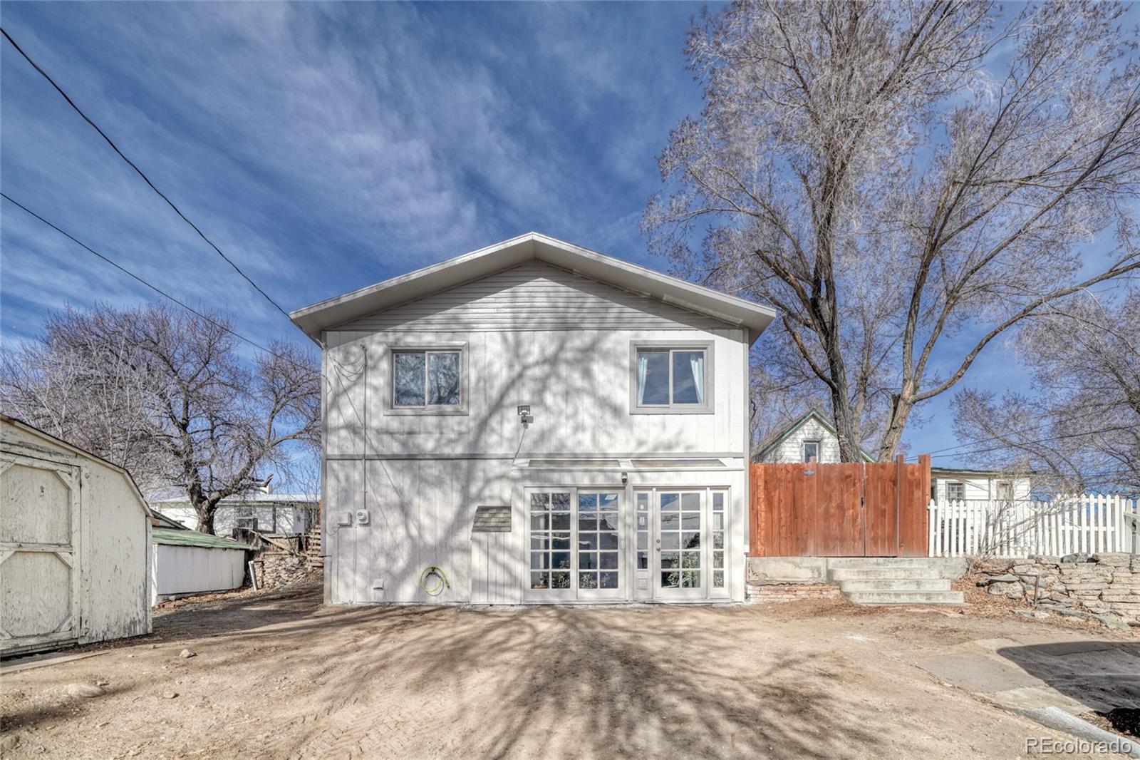 1335 F Street Salida, CO 81201 - Photo 26 of 44 a front view of a house with a yard